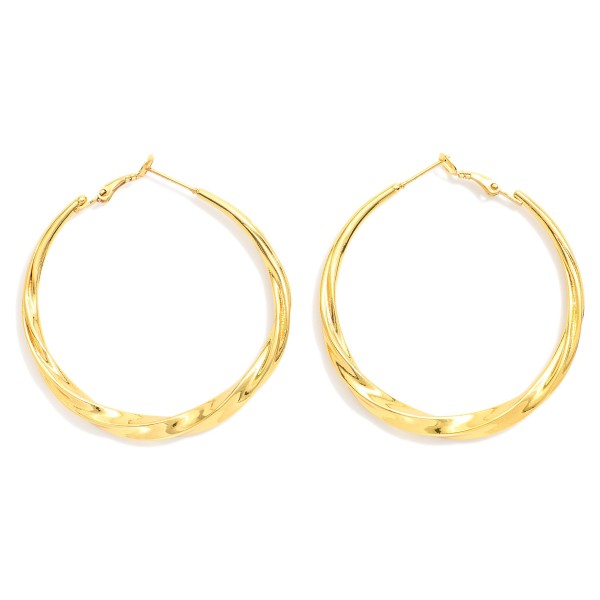  Metal Tone Twist Hoop Earrings 

- Stainless Steel
- Water Resistant
- Approximately 1.75" D