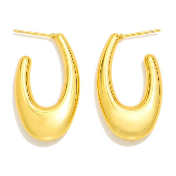Tapered Metal Tone Oval Hoop Earrings 

- Stainless Steel
- Water Resistant
- Approximately 1.25" L