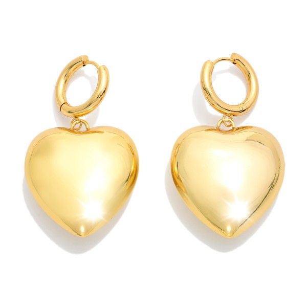 Metal Tone Hoop & Large Puffy Heart Drop Earrings 

- Stainless Steel
- Water Resistant
- Approximately 2" L