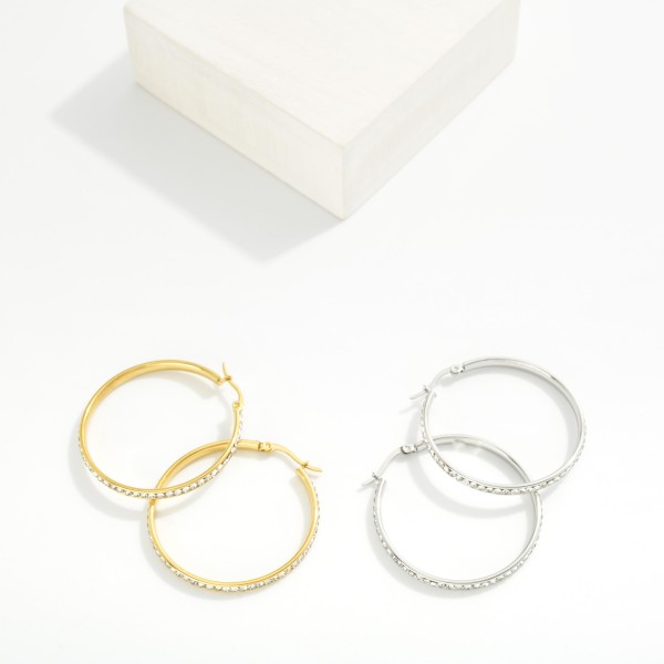 Rhinestone Studded Hoop Earrings 

- Stainless Steel
- Water Resistant
- Approximately 1.25" D