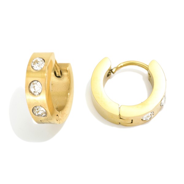 Metal Tone Hinged Huggie Hoop Earrings With Rhinestone Details 

- Stainless Steel
- Water Resistant
- Approximately .25" D