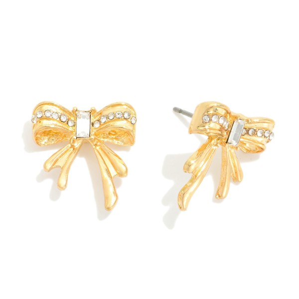 Metal Tone Bow Stud Earrings Featuring Rhinestone Details

- Approximately .75" L