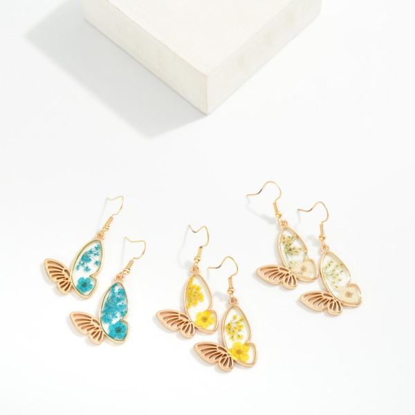 Metal Tone & Resin Butterfly Drop Earrings Featuring Flower Details 

- Approximately 1.25" L
