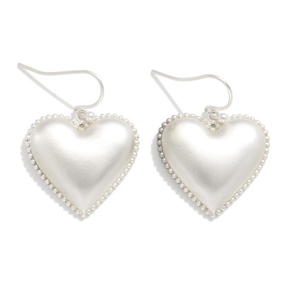 Puffy Metal Tone Heart Earrings Featuring Studded Edge Detail 

- Approximately 1" L