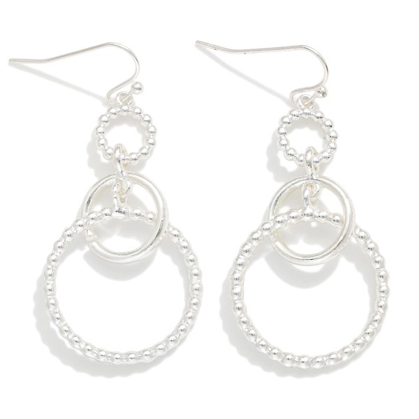 Linked Textured Metal Circle Drop Earrings

- Approximately 2" L 
