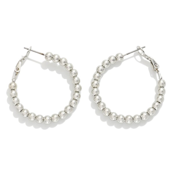 Metal Tone Beaded Hoop Earrings 

- Approximately 1" D