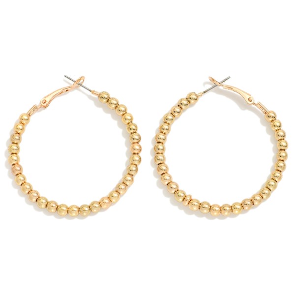 Metal Tone Beaded Hoop Earrings 

- Approximately 1.5" D