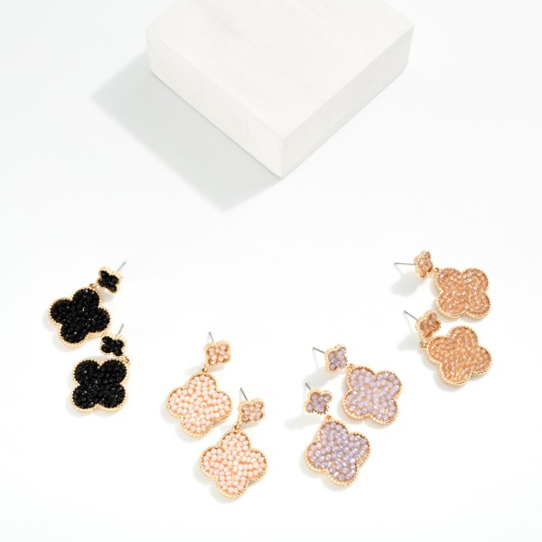 Linked Metal Clover Featuring Faceted Bead Filled Drop Earrings

- Approximately 1.5" L 