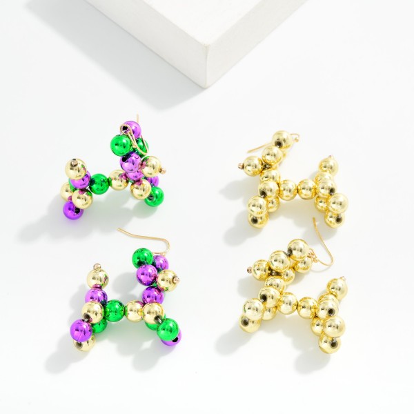 Mardi Gras Beaded Balloon Dog Earring 

- Approximately 2" L 