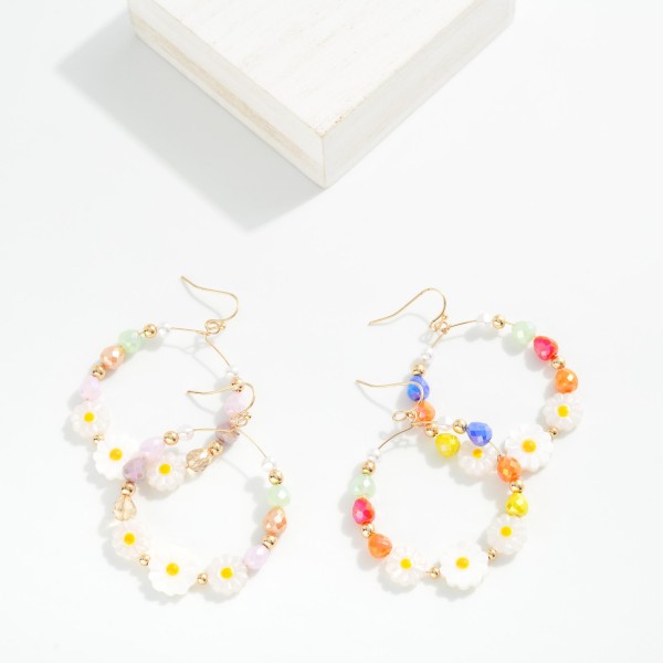 Metal Wire Hoop Earrings Featuring Faceted Beads, Flowers, & Pearls 

- Approximately 2" L