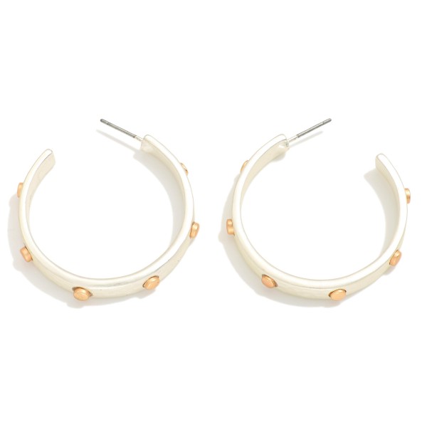 Metal Tone Hoop Earrings Featuring Metal Stud Detail 

- Approximately 1.5" D

