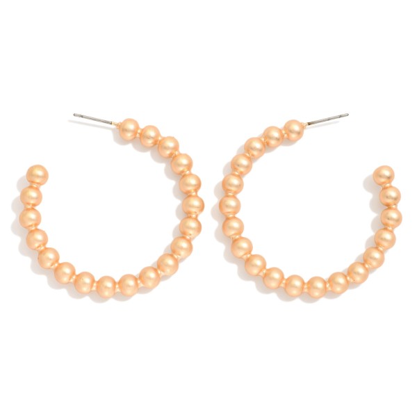Metal Tone Beaded Hoop Earrings 

- Approximately 1.5" D