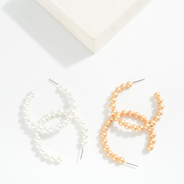 Metal Tone Beaded Hoop Earrings 

- Approximately 1.5" D