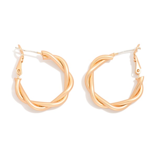 Twisted Metal Hoop Earrings

- Approximately .75" D