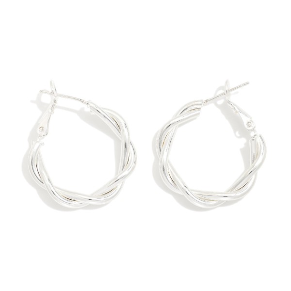 Twisted Metal Hoop Earrings

- Approximately .75" D