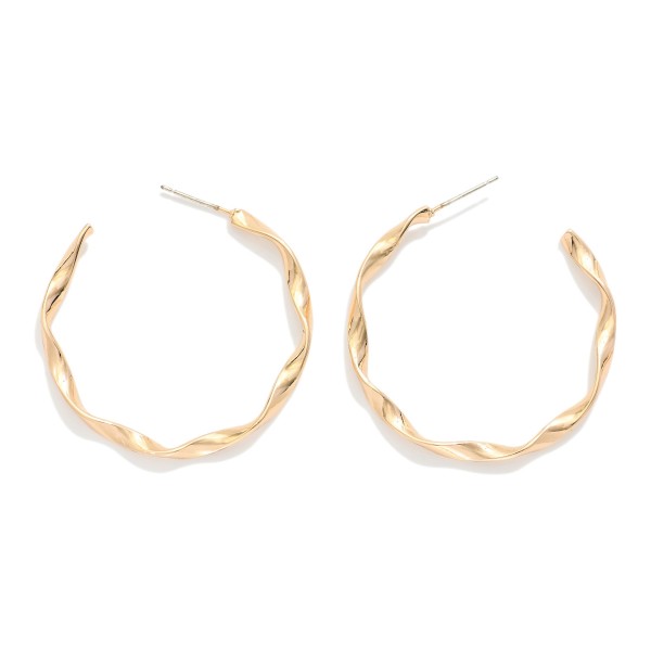 Twisted Metal Hoop Earrings 

- Approximately 1.5" D