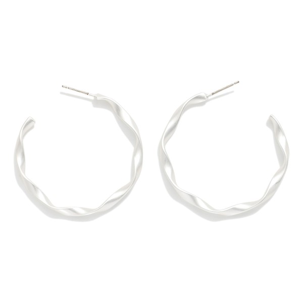 Twisted Metal Hoop Earrings 

- Approximately 1.5" D