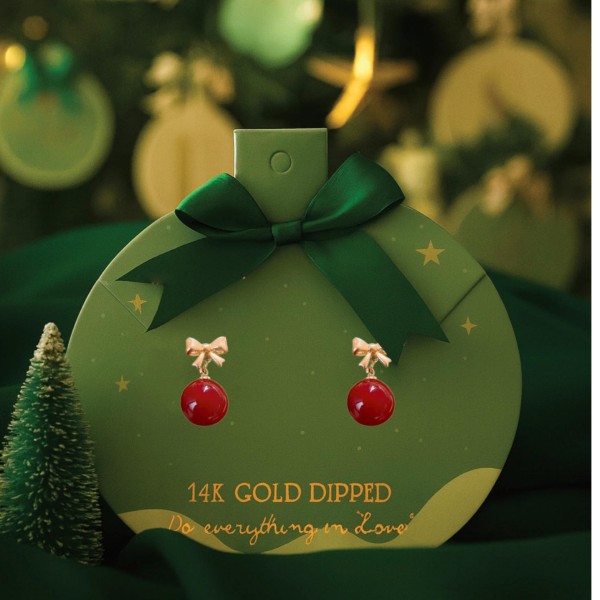 Do Everything In Love Metal Tone Bow & Red Bead Post Drop Earrings 

- Christmas Card Included 
- Gold Dipped 
- Approximately .75" L
