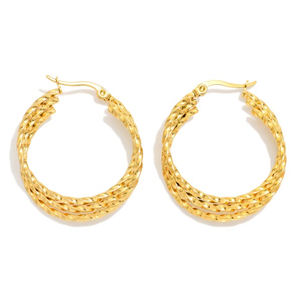 Layered Twisted Metal Hoop Earrings 

- Stainless Steel
- Approximately 1" D