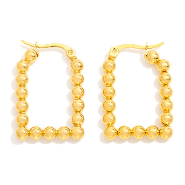 Metal Tone Beaded Square Hoop Earrings

- Stainless Steel
- Water Resistant
- Approximately .75" D