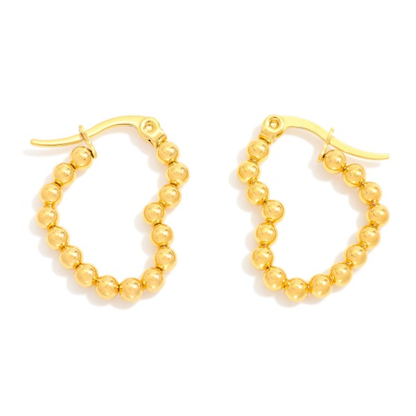 Metal Tone Beaded Heart Hoop Earrings

- Stainless Steel
- Water Resistant
- Approximately .5" D