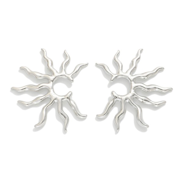 Metal Tone Sun Post Drop Earrings

- Stainless Steel
- Water Resistant
- Approximately 1.25" D