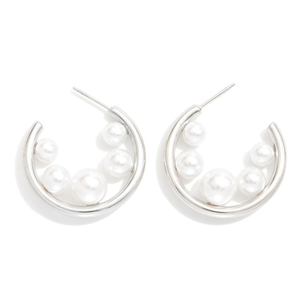 Metal Tone Hoop Earrings Featuring Graduated Pearl Detail 

- Approximately 1" D 