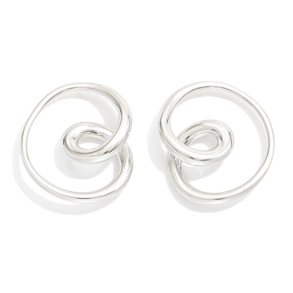  Metal Tone Swirl Post Drop Earrings

- Stainless Steel
- Water Resistant
- Approximately 1.25" L