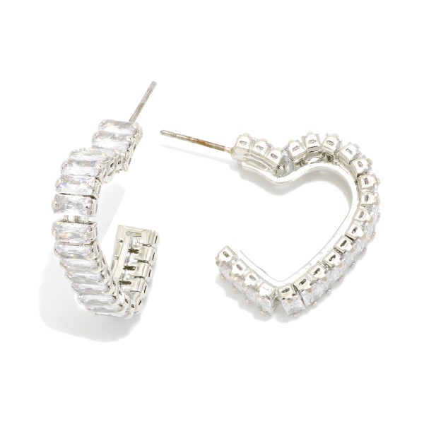 Metal Tone Heart Hoop Earring Featuring Glass Crystals 

- Approximately 1" L  