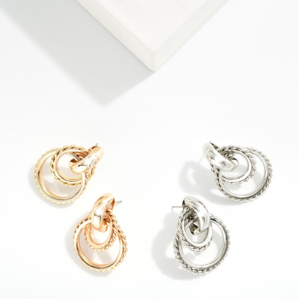 Layered Metal Tone Circle Door Knocker Hoop Earrings Featuring Twist Design 

- Approximately 1.5" L