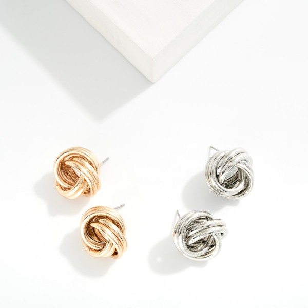 Metal Tone Knotted Drop Earring 

- Approximately .75" D  