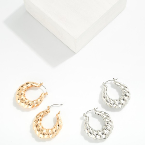 Metal Tone Croissant Huggie Hoop Drop Earring 

- Approximately 1.5" L 