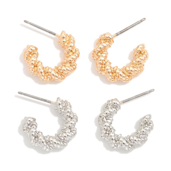 Set Of Two Twisted Metal Tone Hoop Earrings

- Approximately .5" D 

