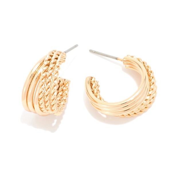 Metal Tone Intertwined Hoop Drop Earrings 

- Approximately .50" D 