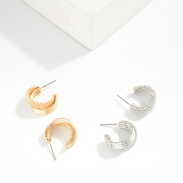 Metal Tone Intertwined Hoop Drop Earrings 

- Approximately .50" D 