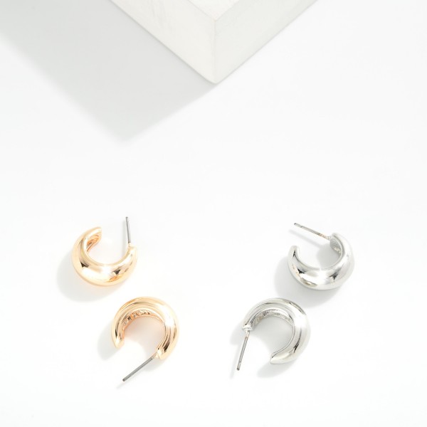 Small Metal Hoop Earrings 

- Approximately  .5" L 