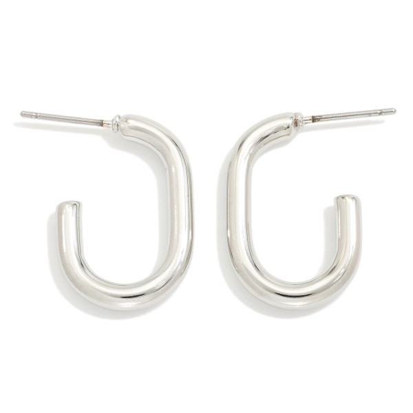 Metal Tone Oval Hoop Earrings 

- Approximately .75" L 