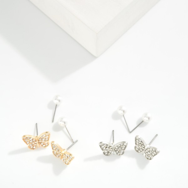 Set Of Two Stud Earrings Featuring Cubic Zirconia Butterfly & Pearls

- Approximately .05" - .50" L 