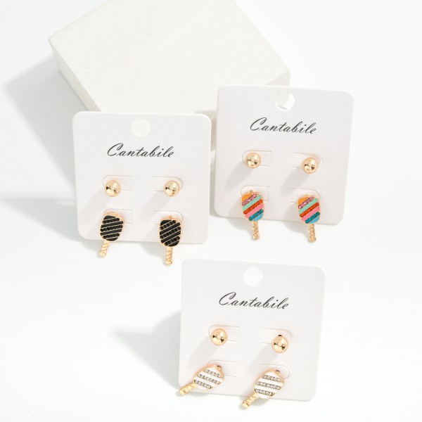 Set OF Two Stud Earrings Featuring Enamel Pickleball Racket & Metal Tone Ball

- Approximately .25" L- .75" L