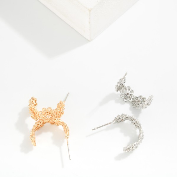 Metal Tone Half Hoop Flower Drop Earring Featuring Rhinestones

- Approximately .75" L 