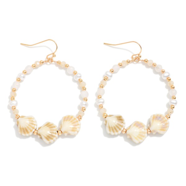 Metal Wire Hoop Earring Featuring Gold Tones, Faceted Beads, Pearls, And Porcelain Shell Beads 

- Approximately 2.5" L 