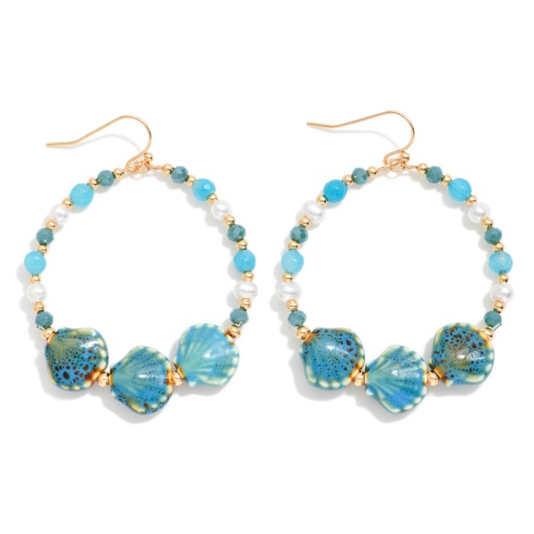 Metal Wire Hoop Earring Featuring Gold Tones, Faceted Beads, Pearls, And Porcelain Shell Beads 

- Approximately 2.5" L 