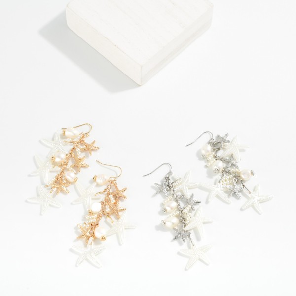 Metal Tone Chain Link Drop Earring Featuring Starfish Charms, Pearls & Metal Tones 

- Approximately 3." L  