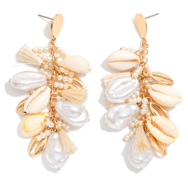 Metal Tone Chain Link Drop Earring Featuring Beach Charms, Pearls & Metal Tones 

- Approximately 3" L  