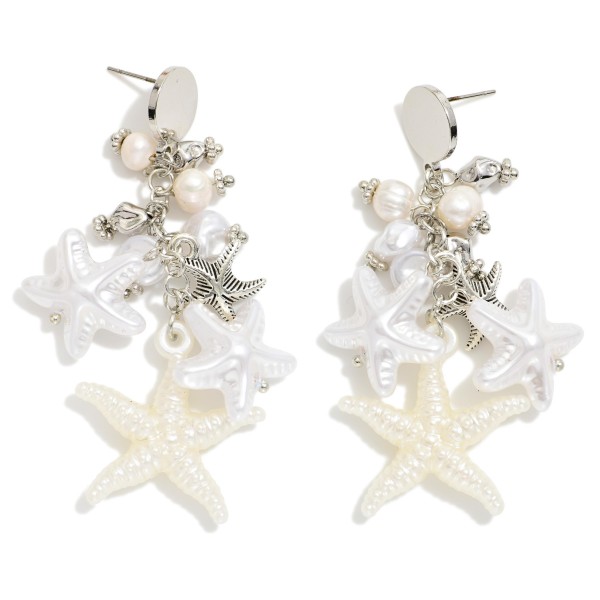 Metal Tone Chain Link Drop Earring Featuring Beach Charms, Pearls & Metal Tones 

- Approximately 2.5" L  