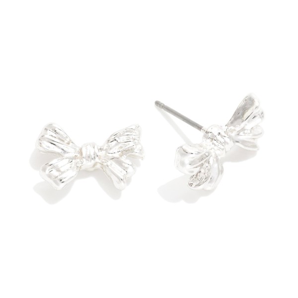 Metal Tone Bow Stud Earrings 

- Approximately .5" L