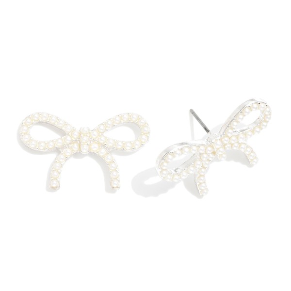 Pearl Studded Bow Stud Earrings 

- Approximately .75: L