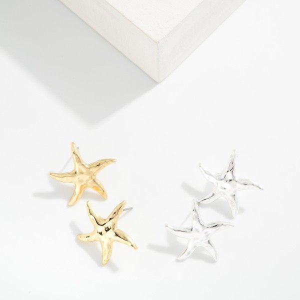 Hammered Metal Starfish Stud Earrings

- Approximately .75" L 