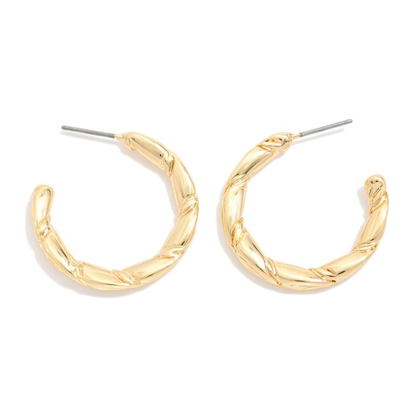 Twisted Metal Tone Hoop Drop Earring 

- Approximately 1" D 