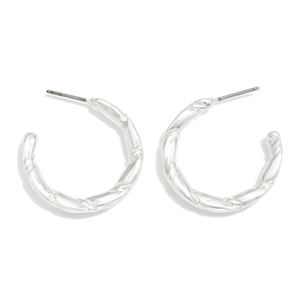 Twisted Metal Tone Hoop Drop Earring 

- Approximately 1" D 